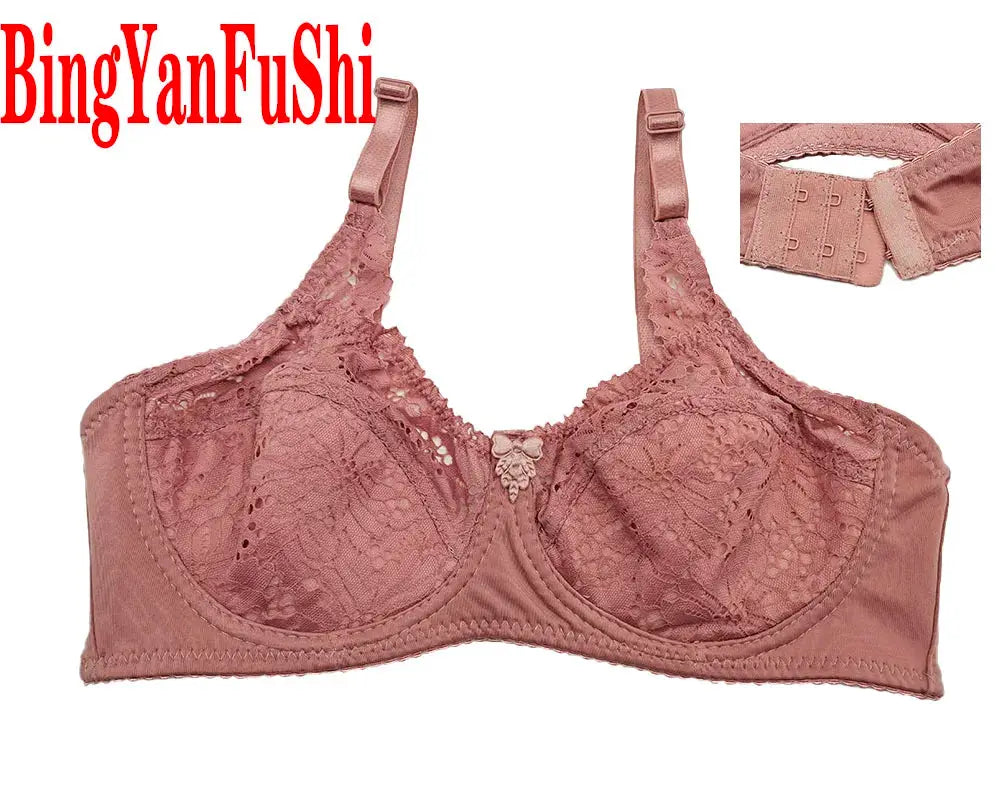 Pink lace bra top by BingYanFuShi with floral full-cup design; adjustable straps, back hook closure