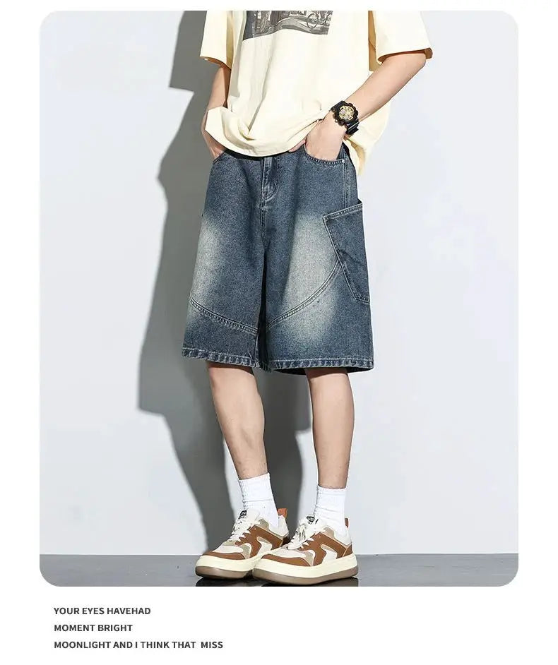 Baggy denim shorts in vintage wash with front pockets, knee-length casual streetwear look