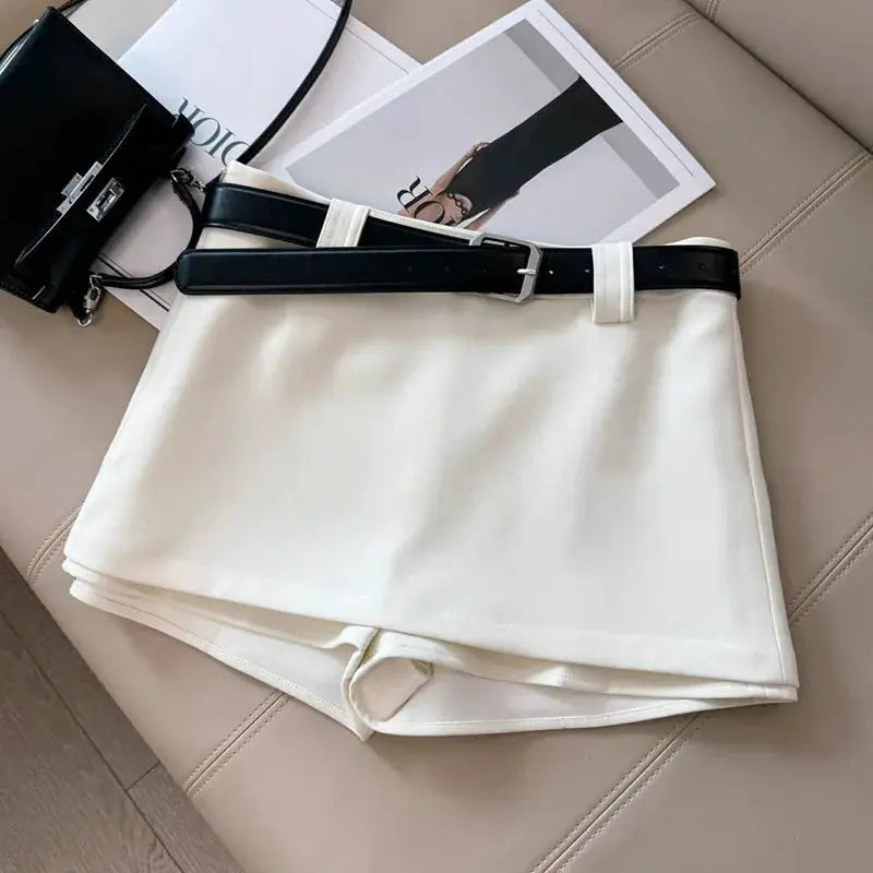 White A-line office skirt with black belt for a Korean-fashion all-match look