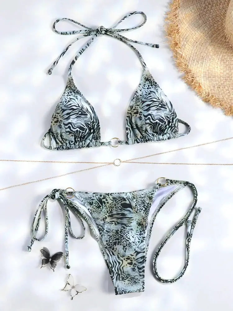 Simples Market animal-print bikini set with triangle halter top and tie-side bottoms in blue-gray zebra pattern
