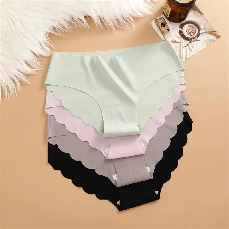 Ice Silk Seamless Panties 4PCS set in pastel colors with scalloped wavy sides.