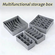Simples Market gray four-piece multifunctional storage box set with divided compartments for drawers and wardrobe organization.