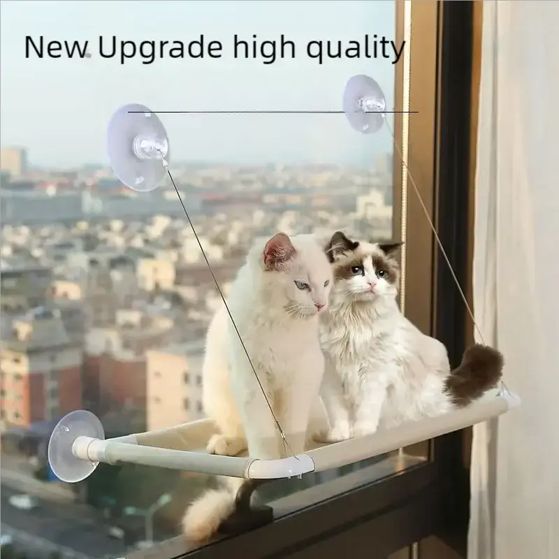 Cat hammock window bed with suction cups; two cats perched on sunny window seat