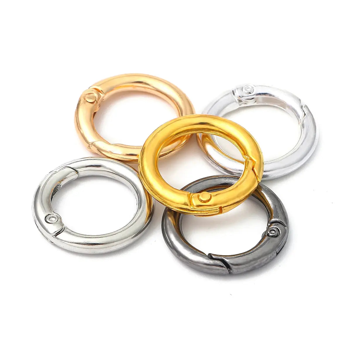 Set of 5 alloy open spring ring keychain rings in gold, rose gold, and silver finishes.