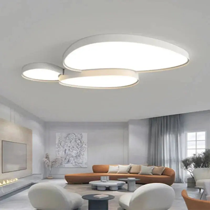 Modern LED ceiling lamp with three white circular discs for living room.