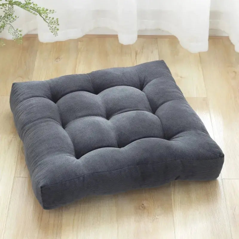 Square floor pillow by Simples Market in charcoal gray tufted cushion for meditation and seating