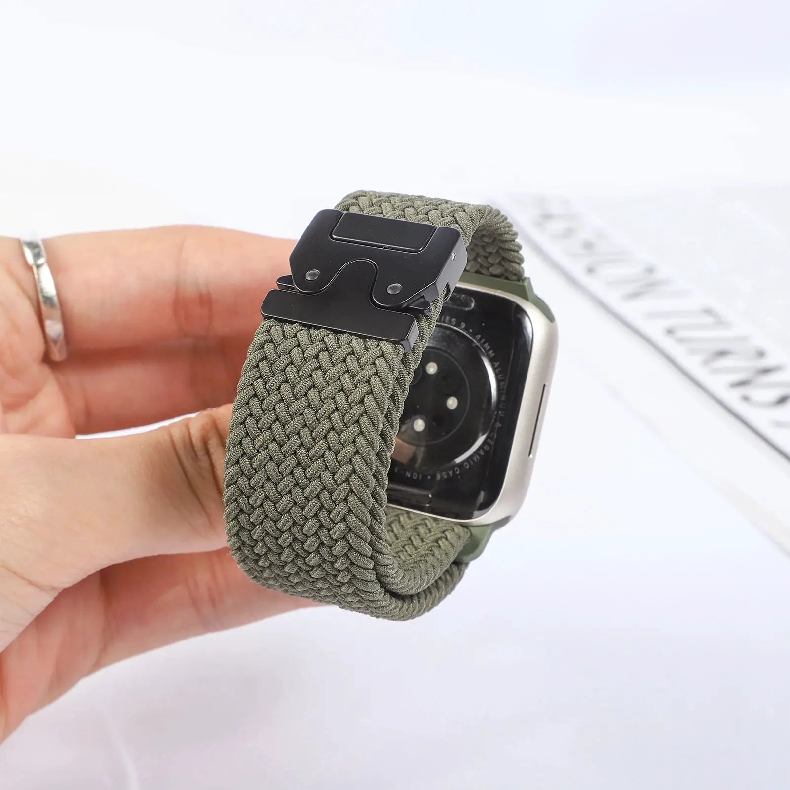 Paracord braided Apple Watch band in olive green with a black metal clasp, Simples Market
