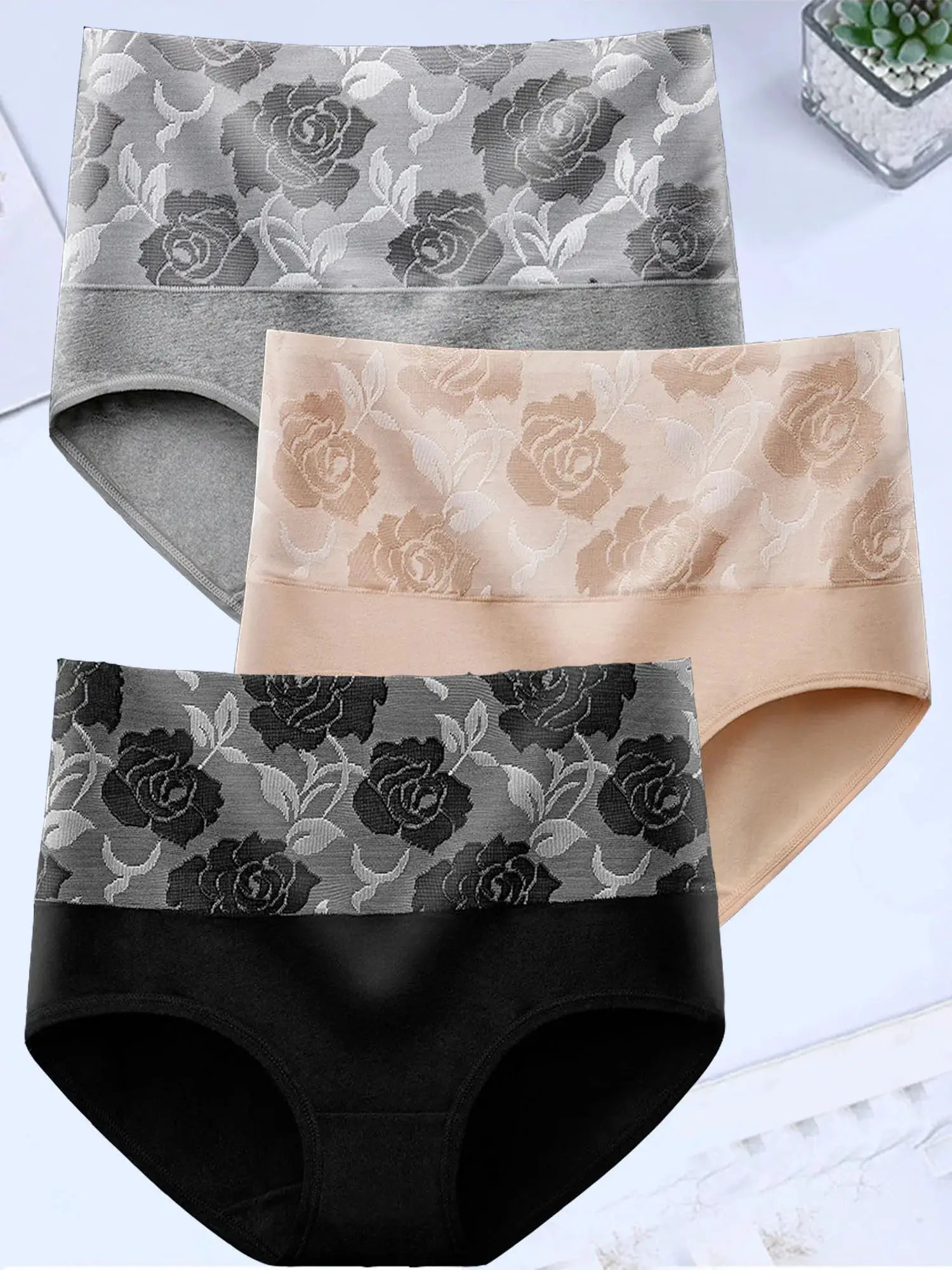 3-pack women's high-waist cotton panties with floral jacquard pattern in gray, beige, and black