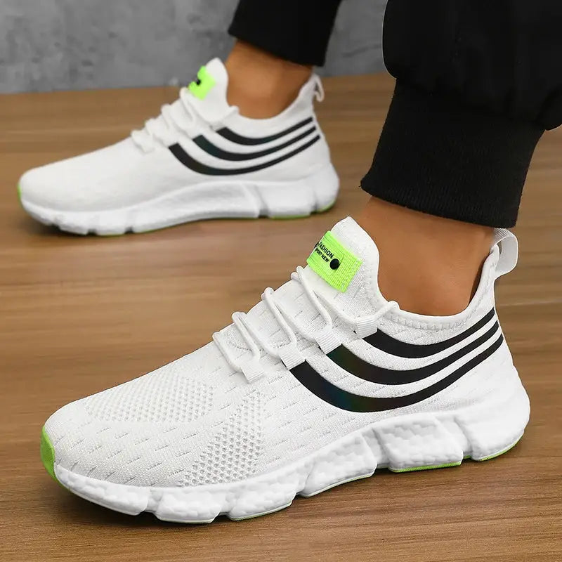 Men's casual athletic sneakers Simples Market, white breathable knit with black stripes and neon-green accents.