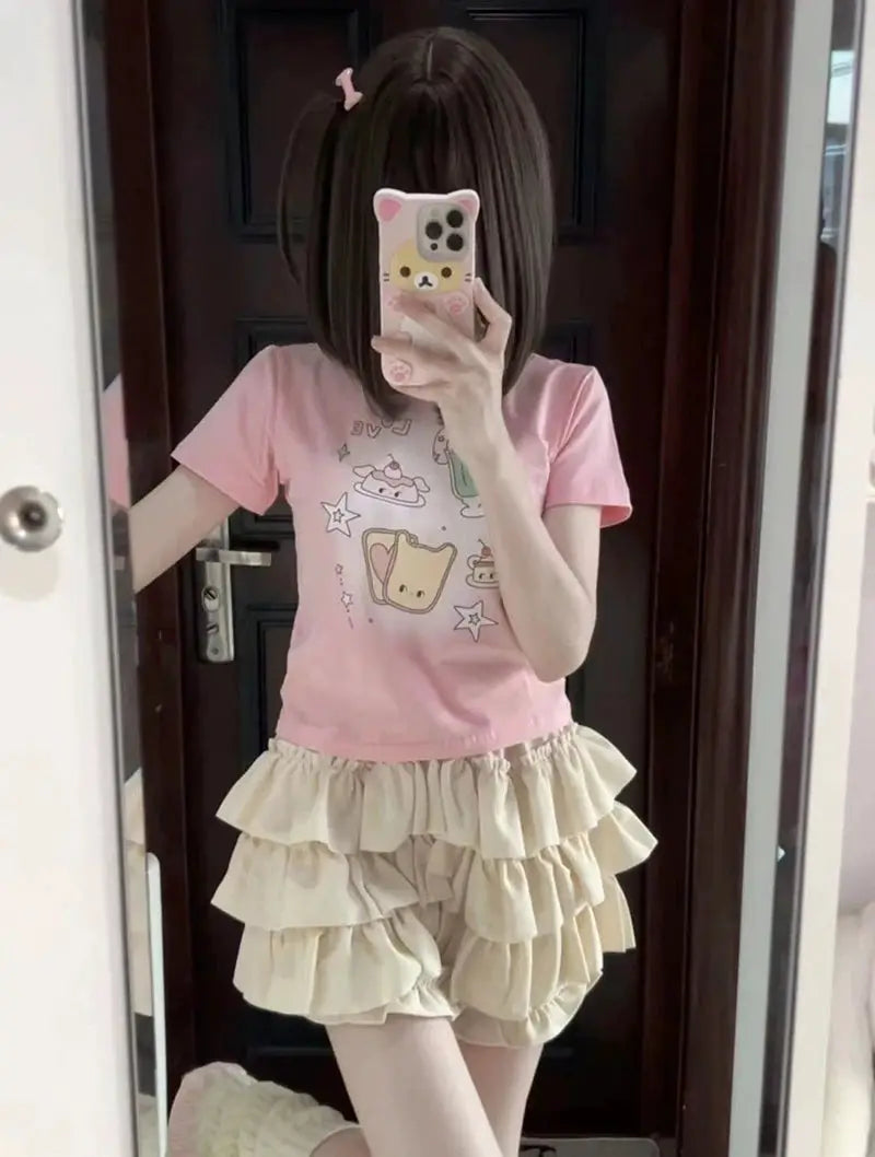 MEXZT Y2K Sweet Ruffles Mini Skirt; cream tiered ruffles, pink top shown