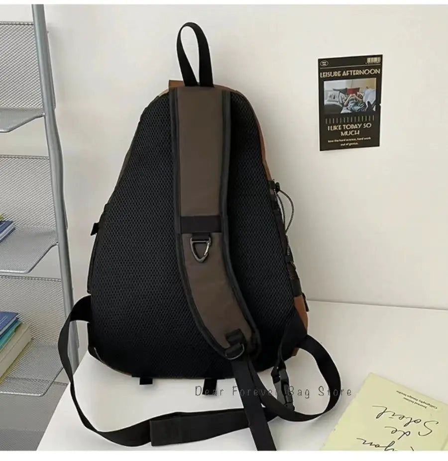 New Y2k portable light nylon crossbody bag by Simples Market, black with brown trim, unisex backpack.