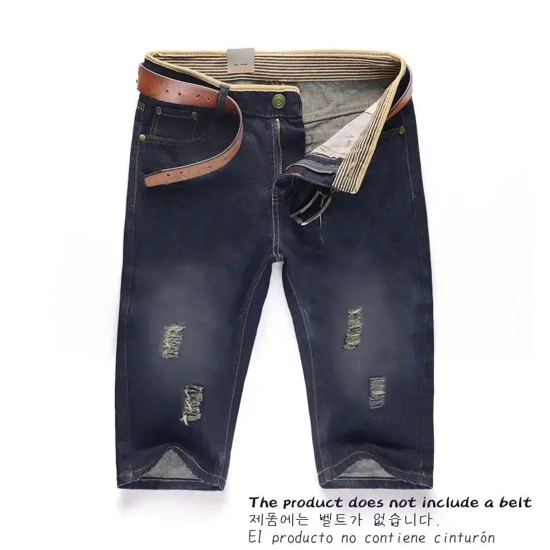 Men's dark blue distressed denim pants by Simples Market with ripped knees; belt not included.