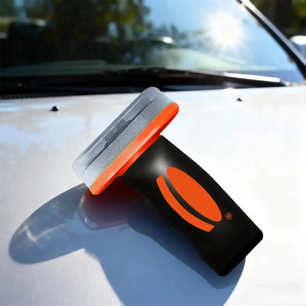 Car glass cleaner gel-foam applicator by Simples Market with black handle and orange logo