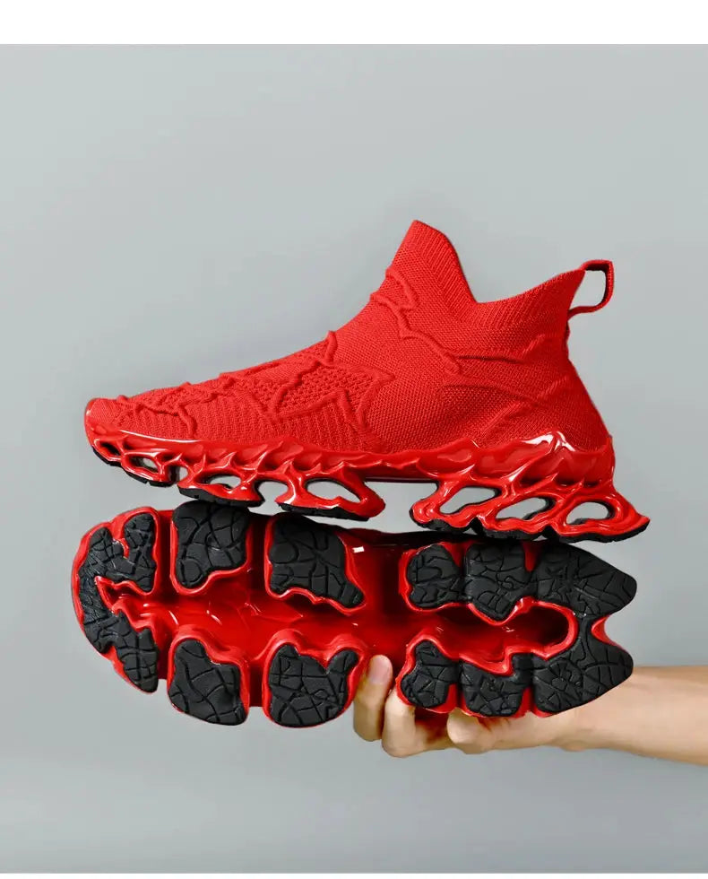 Red knit sneakers with a sculpted hollow red sole and black outsole
