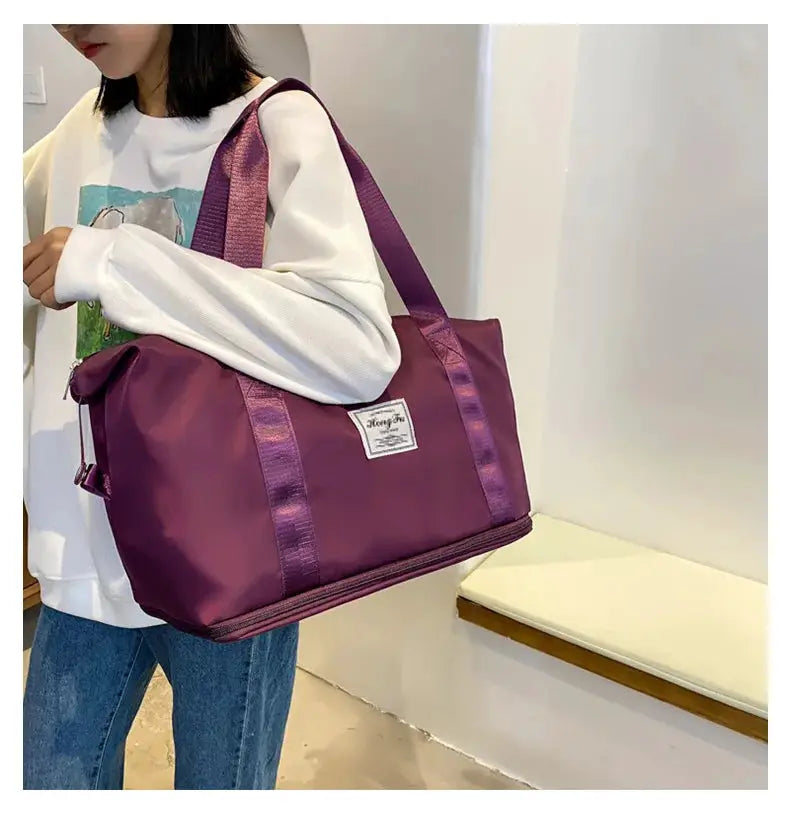 UNIXINU carry-on travel duffle bag in purple nylon; waterproof gym tote by Simples Market with large capacity