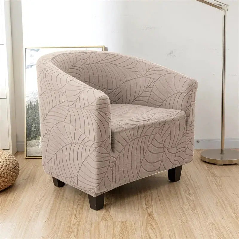 Elastic club chair slipcover in beige leaf jacquard pattern for a single-arm chair