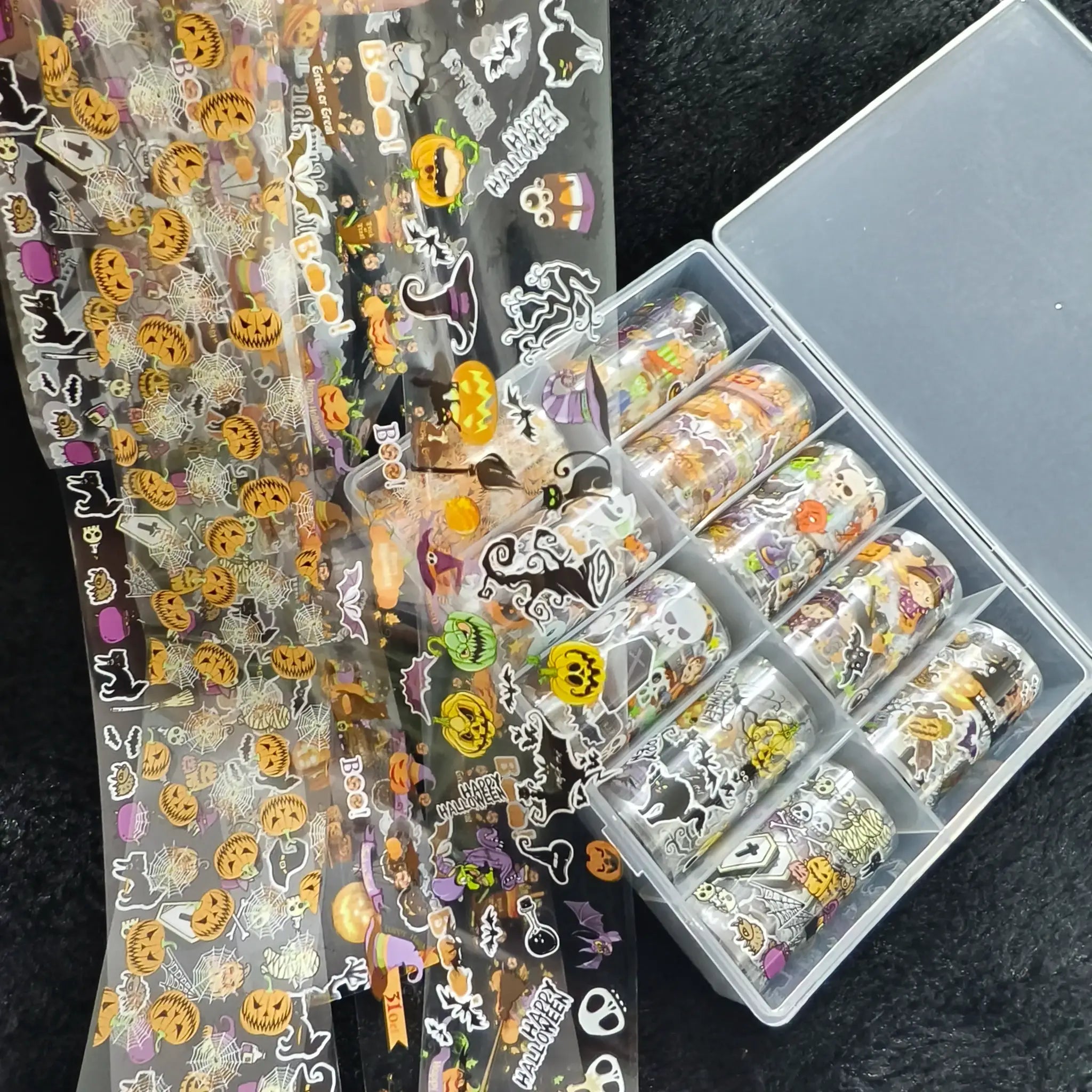 Simples Market Halloween nail foil sheets set, 10 rolls, with pumpkin, spiderweb, bow and ghost decals on clear sheets