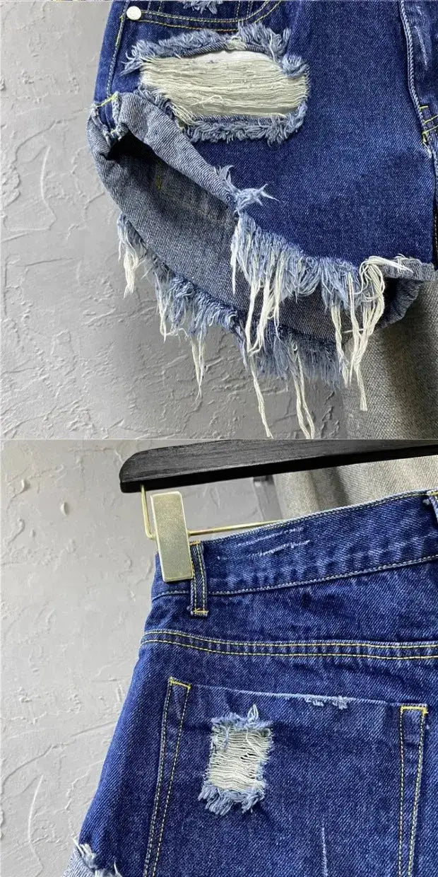 Simples Market women's denim shorts with frayed edges, ripped patches and zipper fly in vintage blue denim
