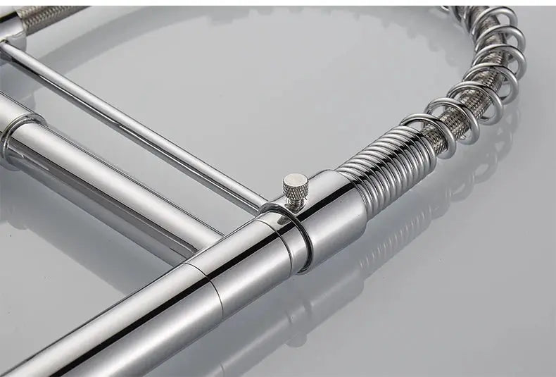 Kitchen faucet with pull-down sprayer and high-arc design, chrome finish, spring coil hose, single-handle