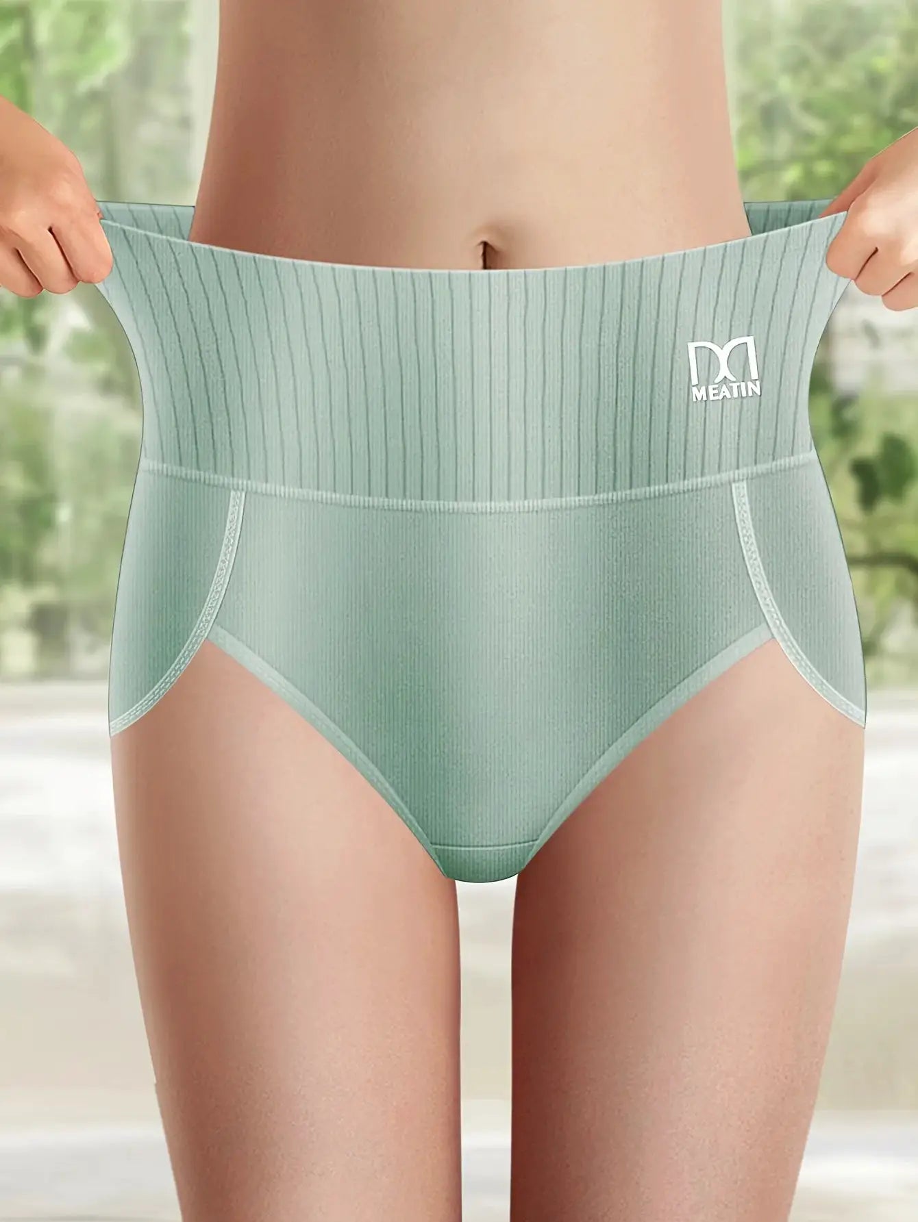 High-waisted tummy-tucking panties in mint green cotton by Meatin, breathable and skin-friendly.