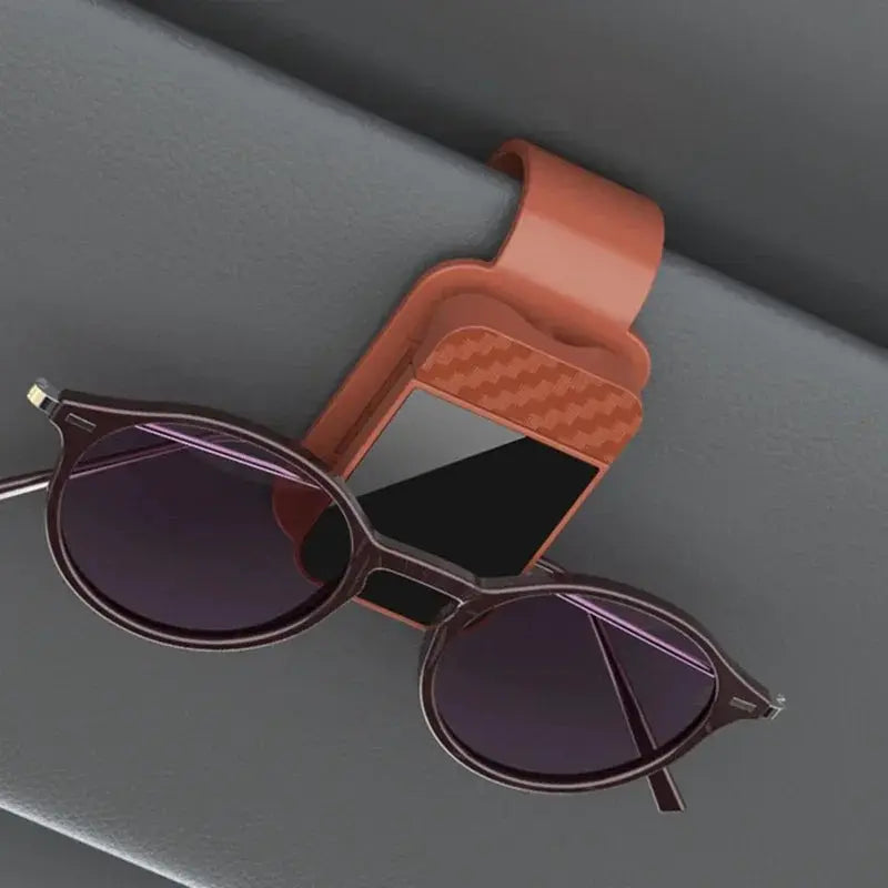 Car sun visor clip with orange-brown silicone card holder for practical interior storage