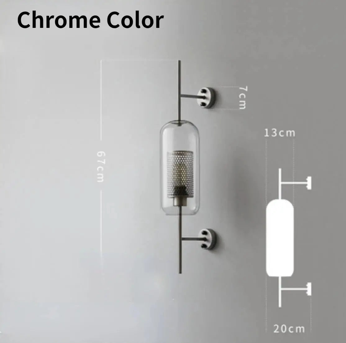 Modern glass wall lamp by Simples Market, chrome finish with a clear cylindrical shade and metal rod.
