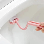 Toilet cleaning brush S-shaped pink handle with white bristles for corner cleaning by Simples Market