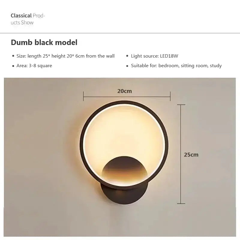 LED wall lamp by Simples Market; circular black ring with warm glow, 20cm wide by 25cm high for living/bedroom decor