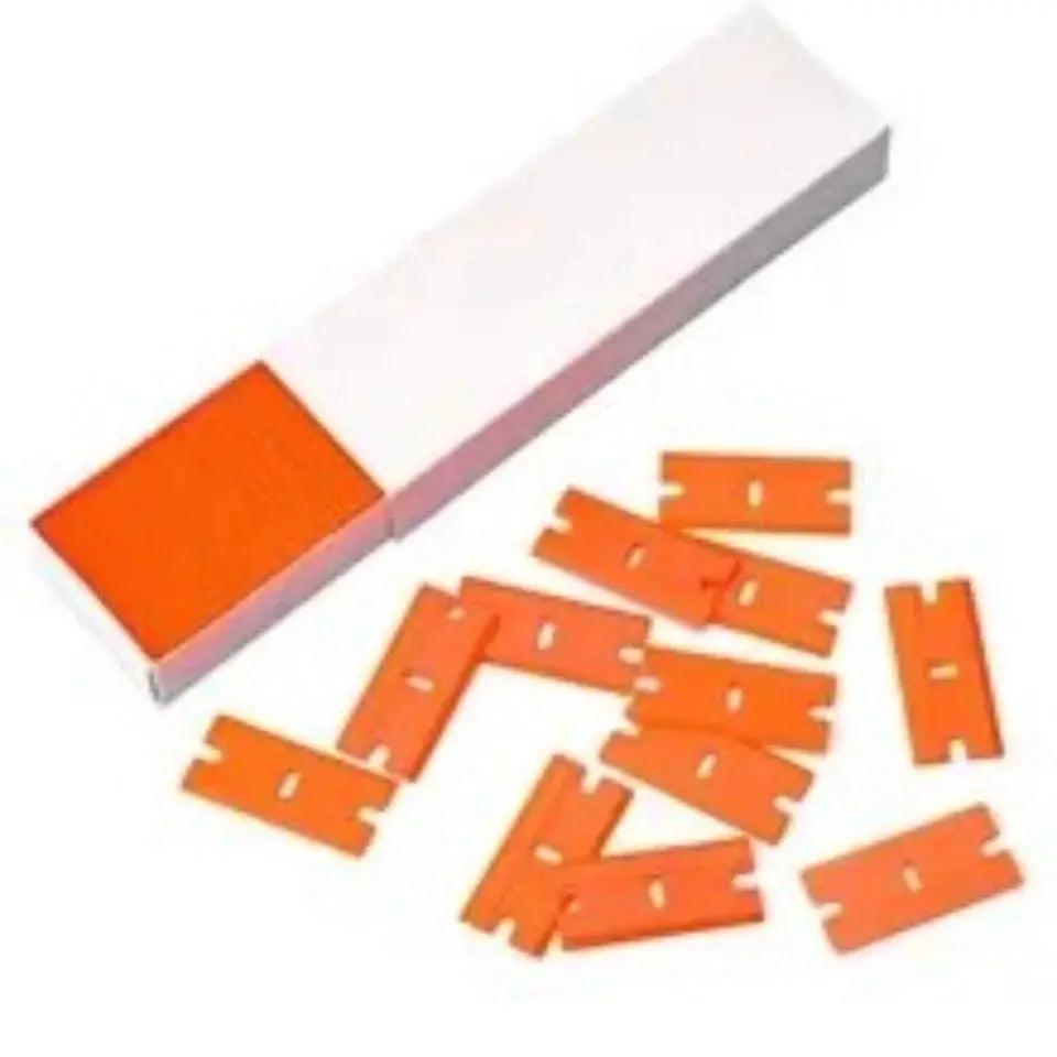 100 orange plastic razor blades for label removal and window cleaning, with white storage box