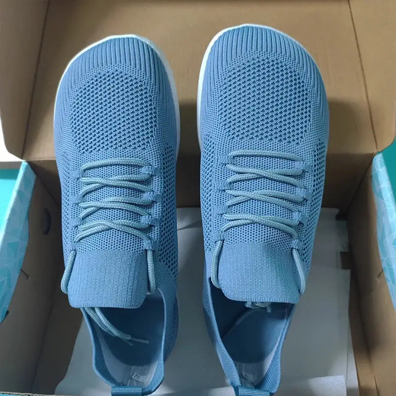 Blue knit running shoes by Simples Market, breathable pair