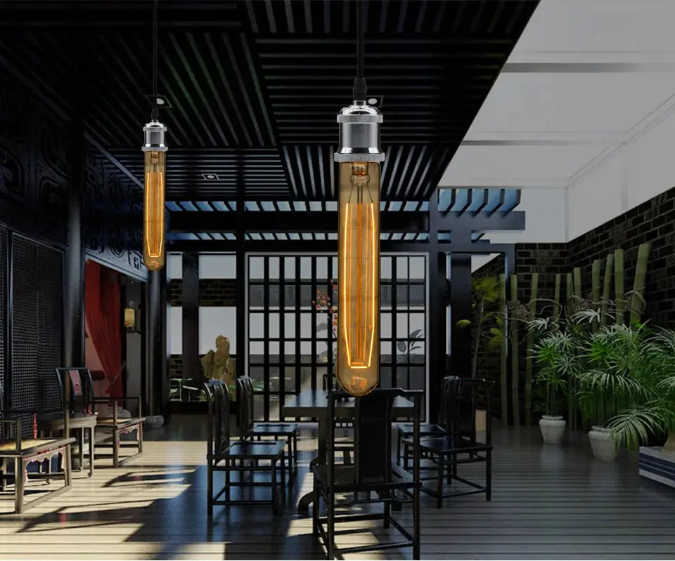 Aluminum pendant lights, two units, with vintage Edison tubes for an industrial Nordic loft look.