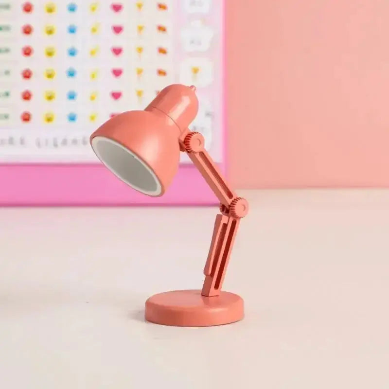 Pink mini book light LED desk lamp with adjustable foldable arm and round base