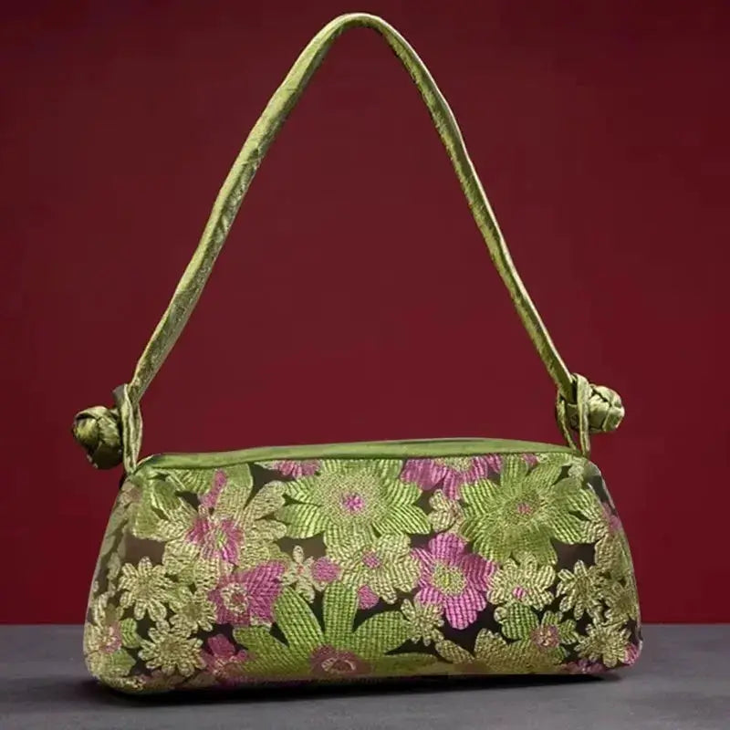 Shoulder bag with green satin and embroidered floral pattern; small women's handbag.