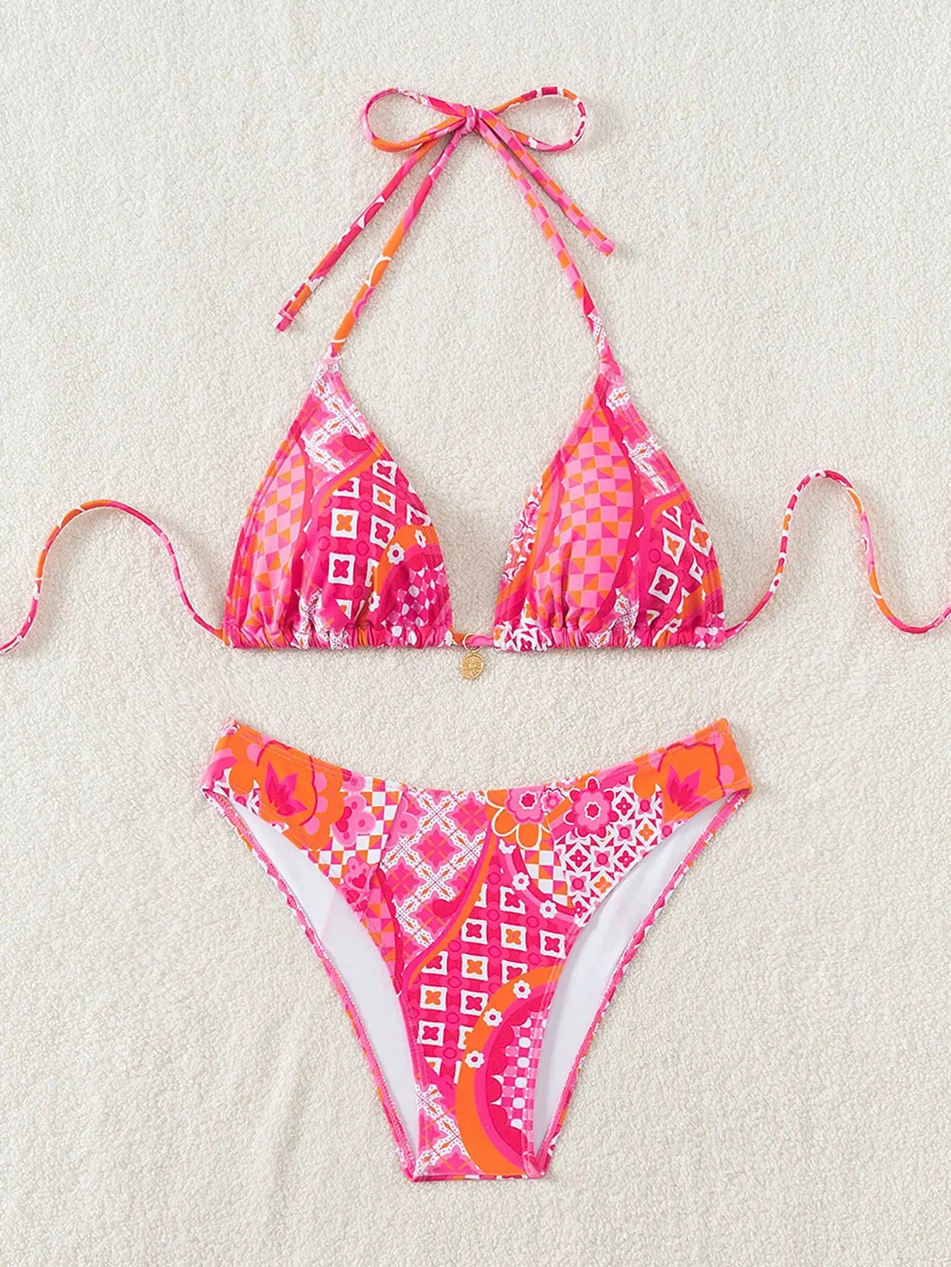Pink floral triangle bikini set with push-up top and Brazilian-cut bottoms