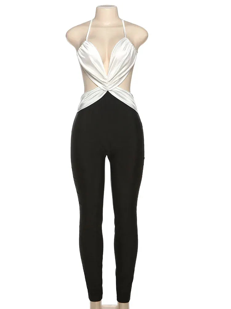 Kliou cross-pleated backless jumpsuit with white halter top and black skinny pants, two-tone clubwear