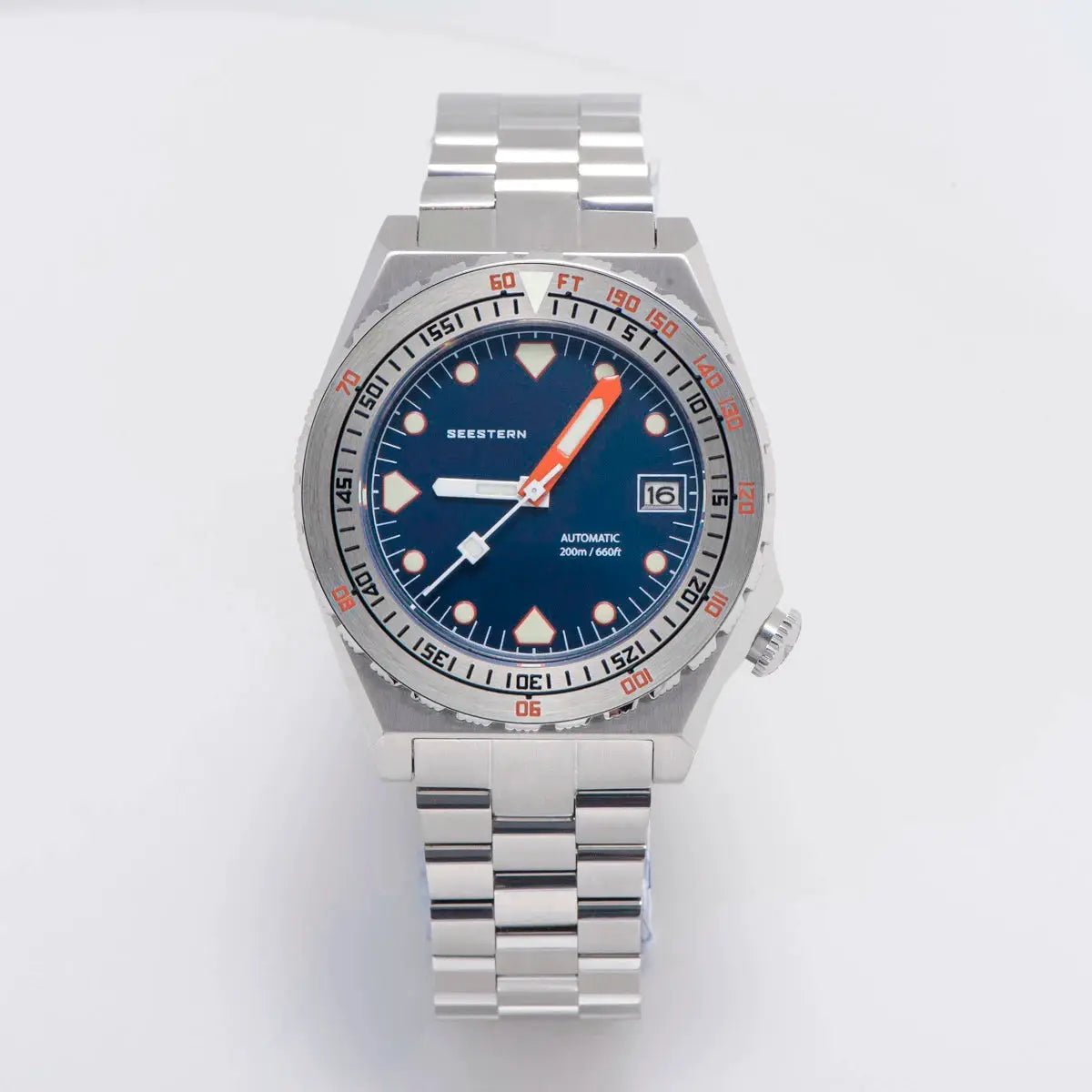 Seestern Sub600T diver watch with stainless steel bracelet blue dial, orange hands, ceramic bezel, 200m water resistant.