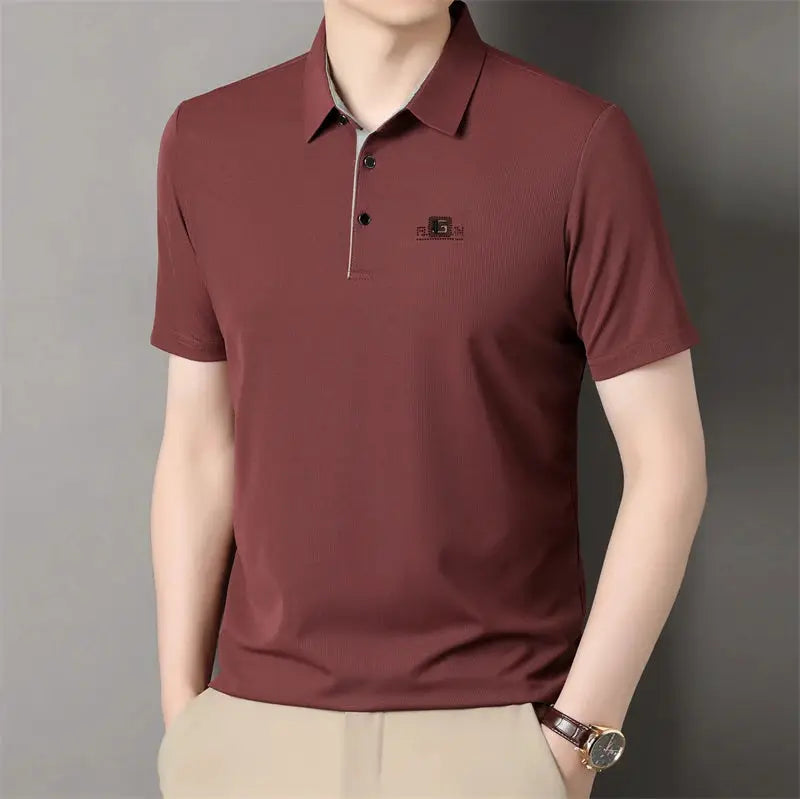 Men's burgundy polo shirt with chest badge, short sleeves