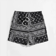 Men's bandana-print beach shorts, black with white paisley pattern, Simples Market drawstring waist