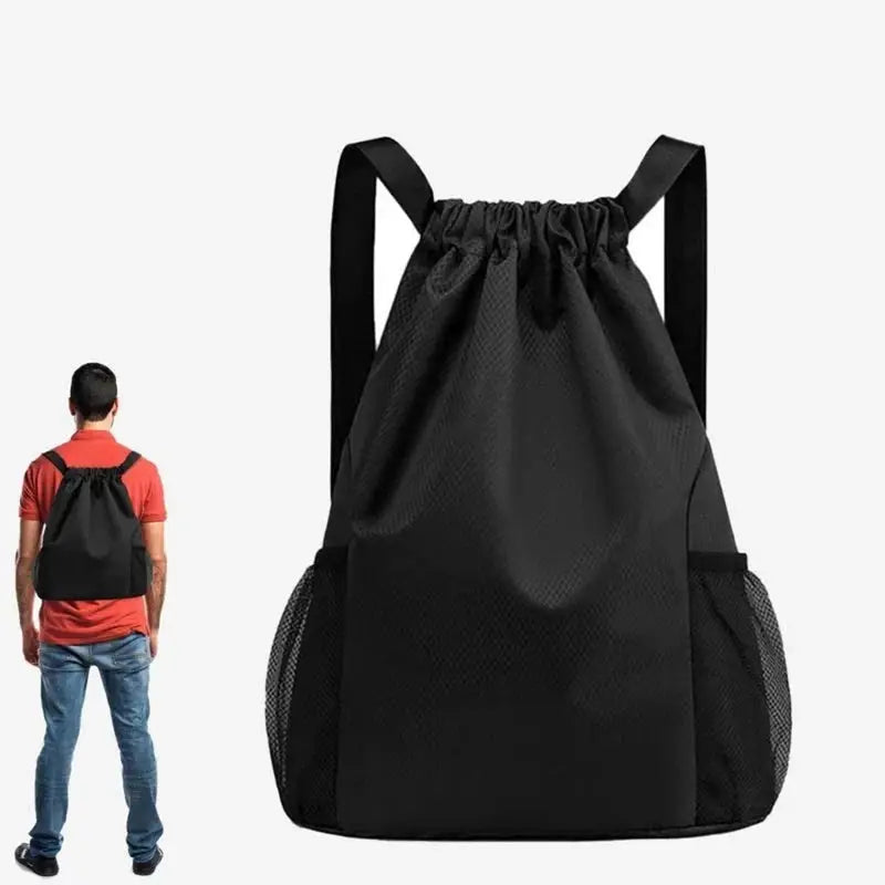 Drawstring backpack, black, unisex, large capacity with mesh side pockets.