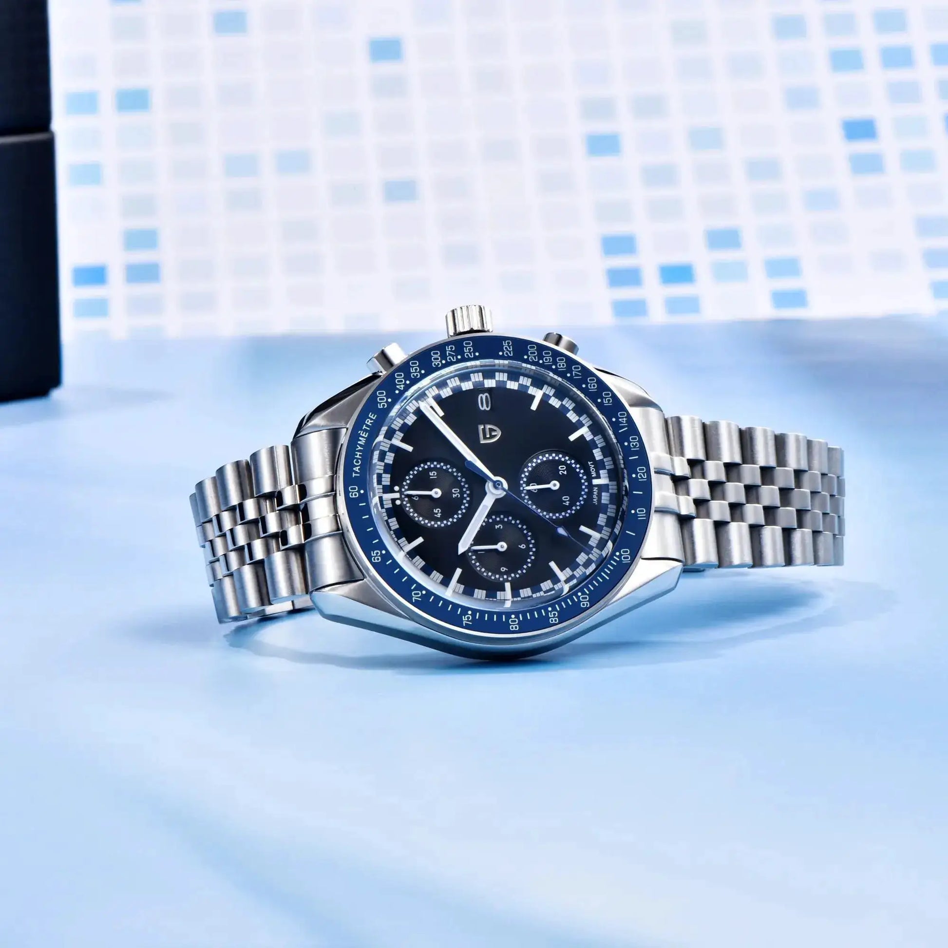 PAGANI DESIGN men's chronograph wristwatch with blue tachymeter bezel and stainless steel bracelet.