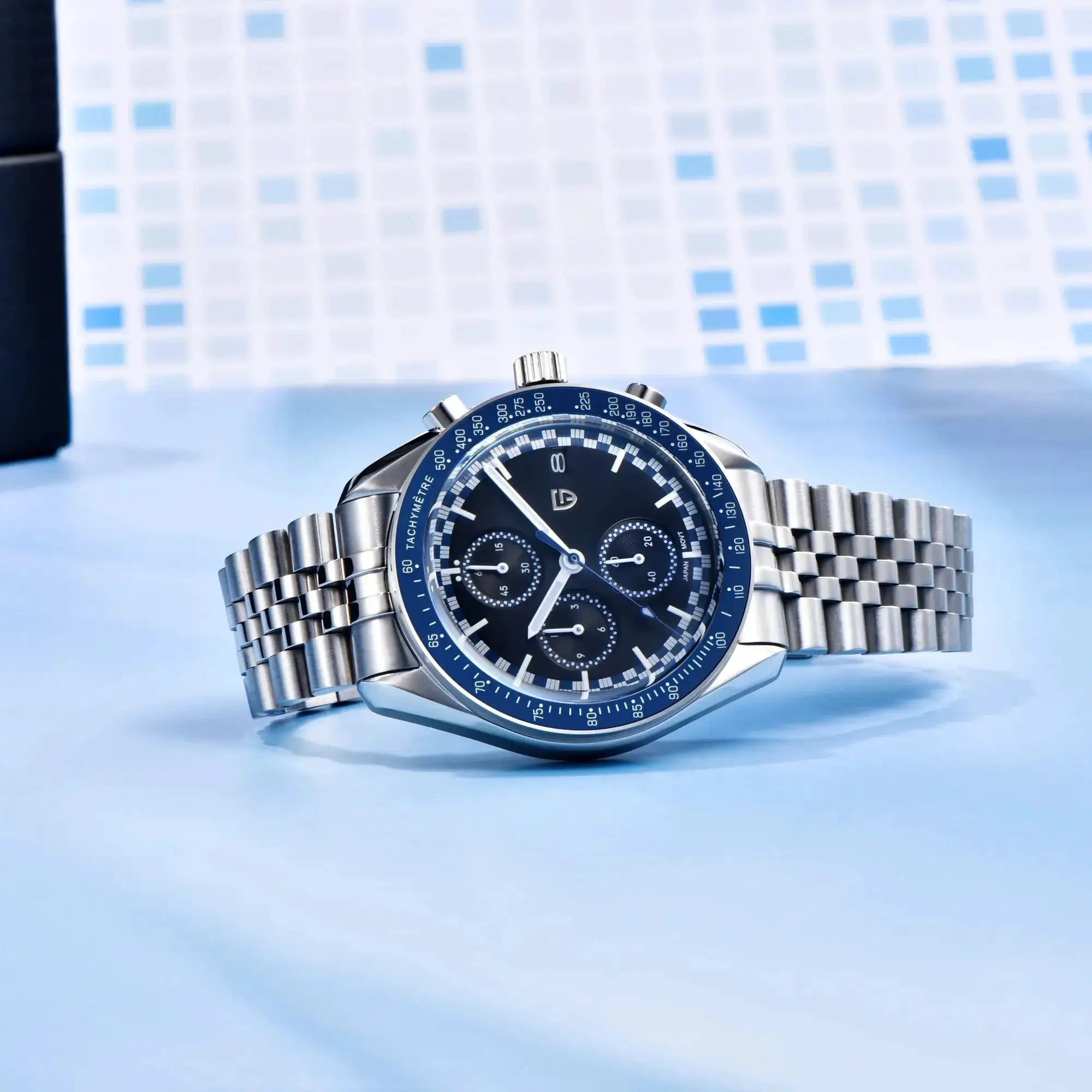 PAGANI DESIGN men's chronograph wristwatch with blue tachymeter bezel and stainless steel bracelet.