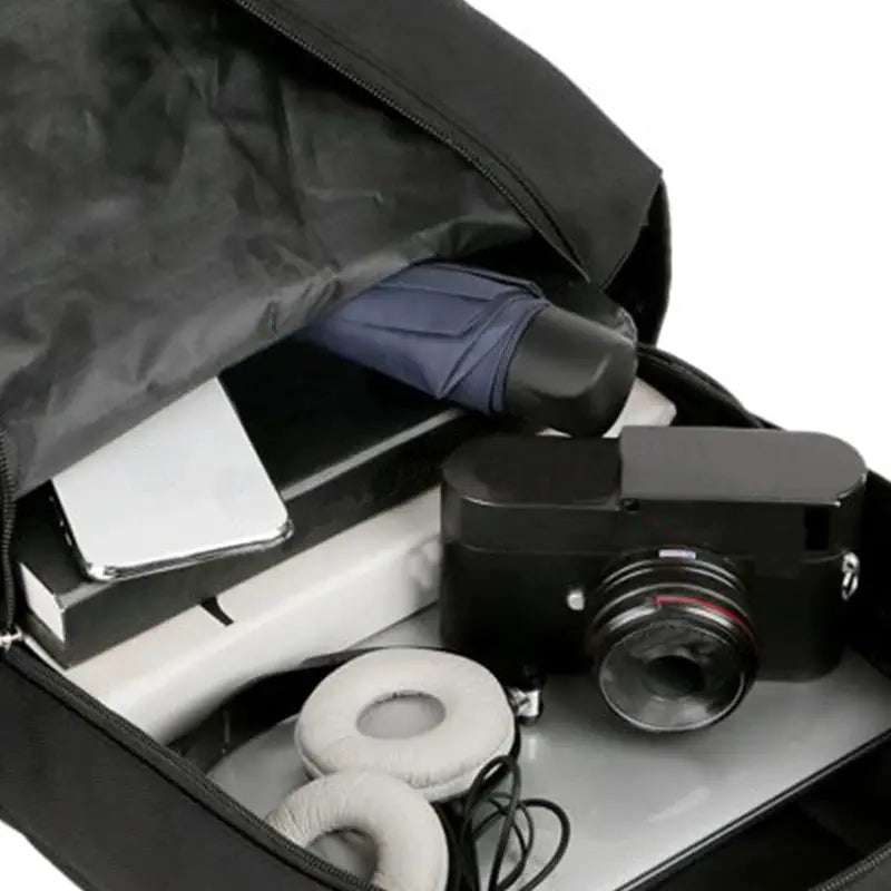 Business casual backpack for men by Simples Market with laptop compartment; interior holds camera gear and headphones.