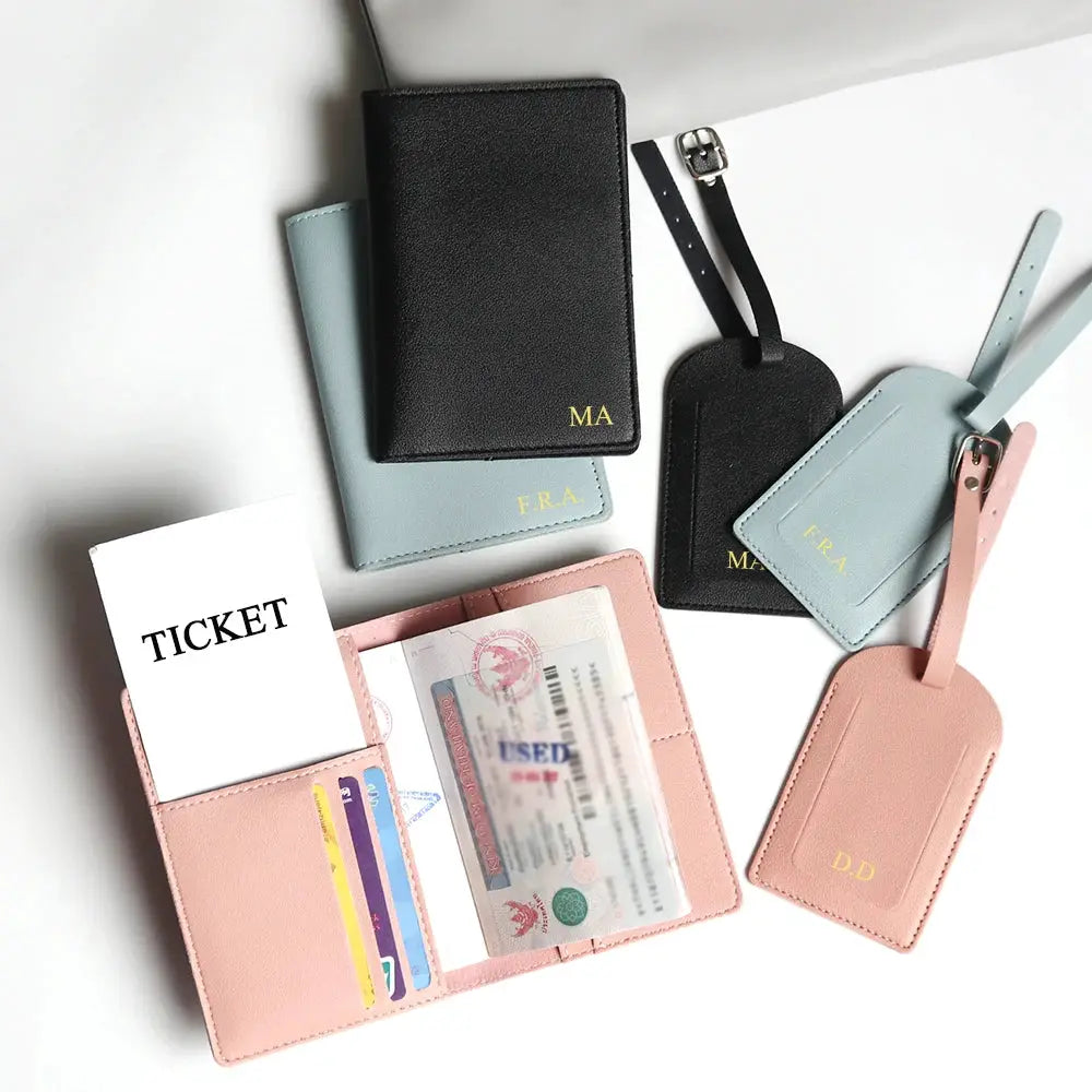 Custom name travel passport cover set with luggage tags and card holders in black, pink, and pastel blue faux leather