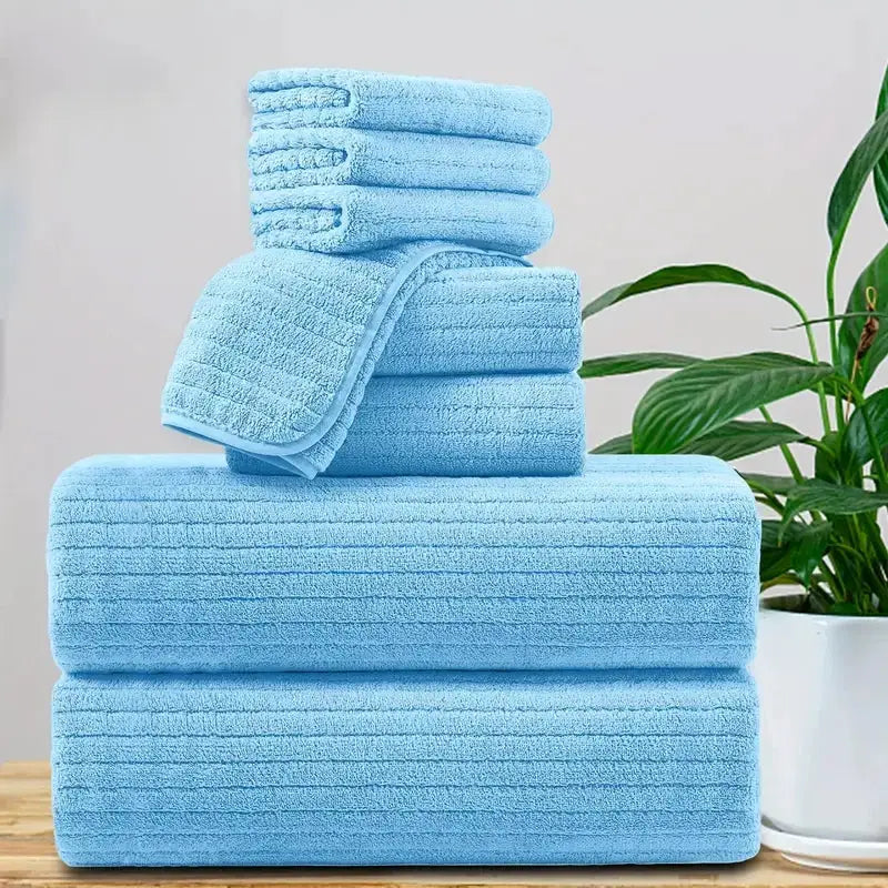 8-piece towel set by Simples Market in light blue; 2 bath towels, 2 face towels, 4 washcloths; absorbent, quick-drying