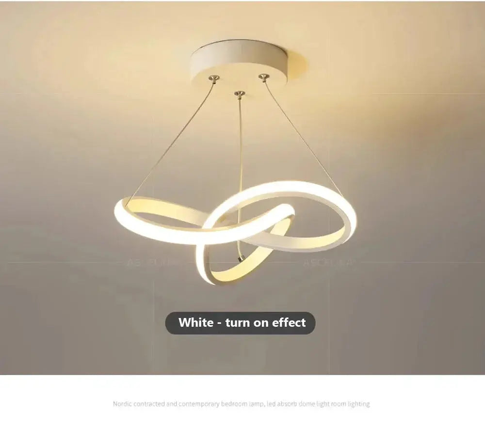 Nordic LED ceiling pendant lamp with white illuminated interlocking rings by Simples Market, modern decor.