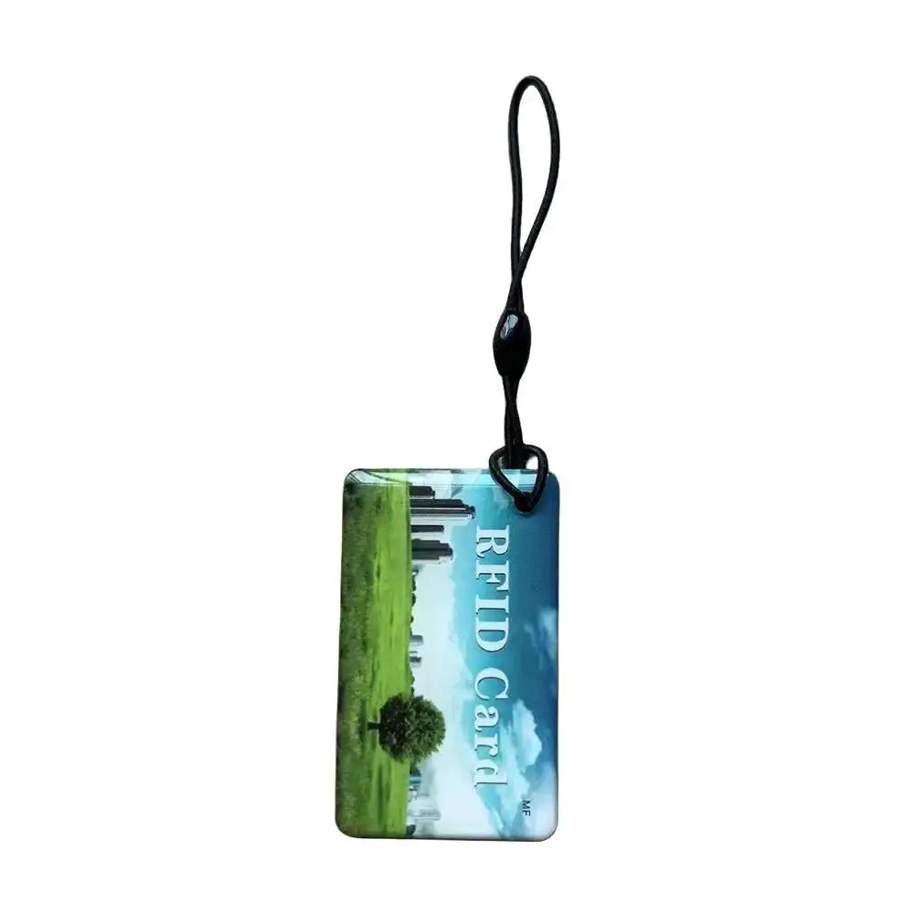 RFID key tag with black lanyard and blue-green landscape pattern, waterproof 13.56MHz UID rewritable card