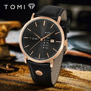 TOMI men's quartz wristwatch with black dial and rose-gold case, featuring a weekday calendar