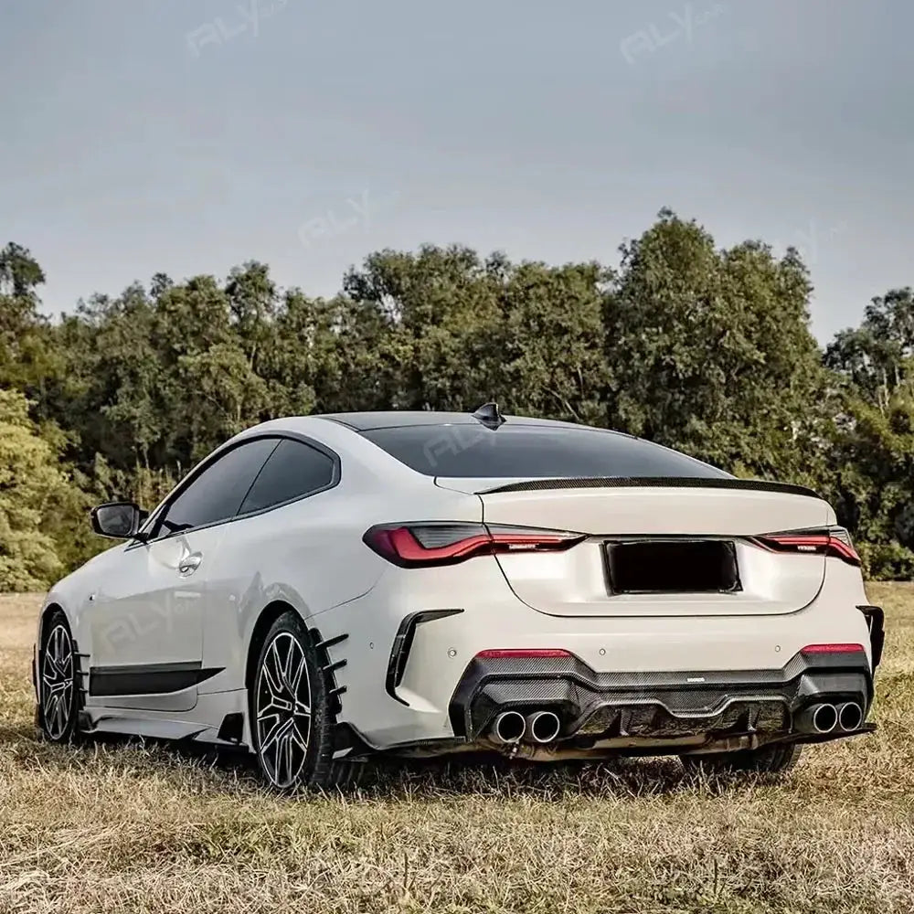 Car spoiler accessory 1.2m black carbon fiber rear wing on a white sedan