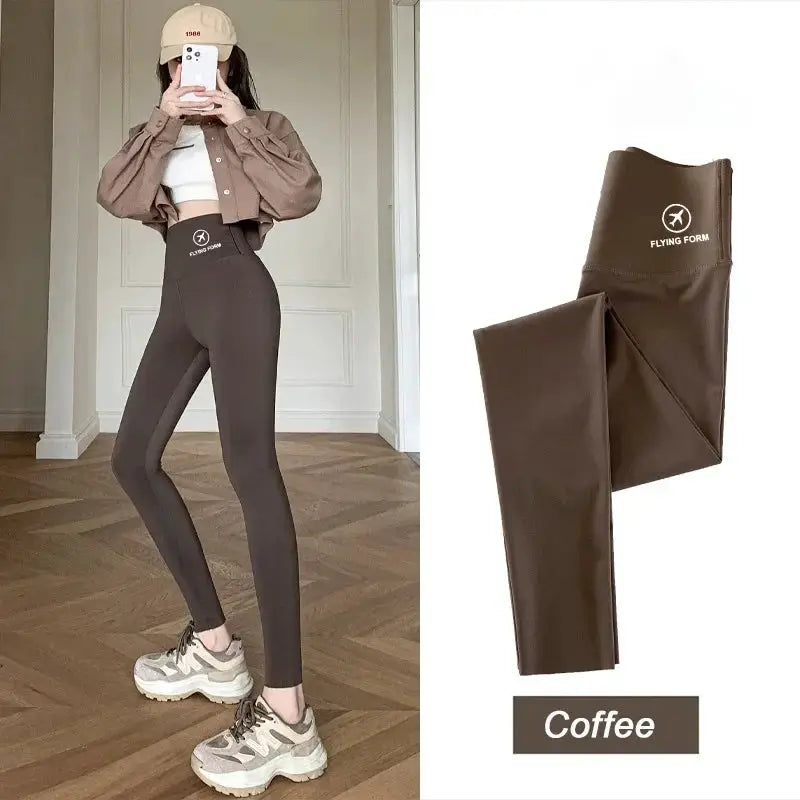Coffee brown high-waisted yoga leggings by Simples Market with Flying Form logo; two views show full-length model.