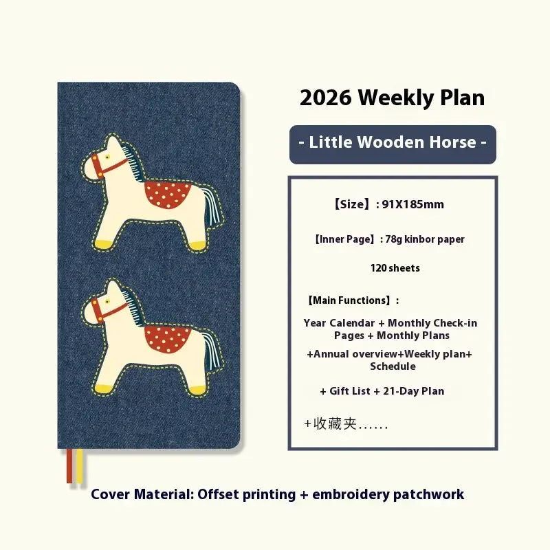 Kinbor 2026 weekly plan pocket notebook with denim cover and two embroidered horse patches; ribbon bookmarks.